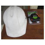 Hard hat and tape measure