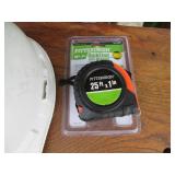 Hard hat and tape measure