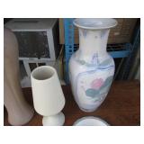 Clamshell closing tote containing a...