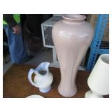 Clamshell closing tote containing a...