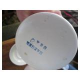 Clamshell closing tote containing a...