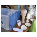 Clamshell closing tote containing a...