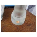 Clamshell closing tote containing a...