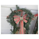 Pair of Vintage toboggan sleds hugg...