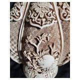 Intricately Carved Ceramic Vase with Floral Design