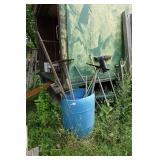 Assorted Rakes and Shovels