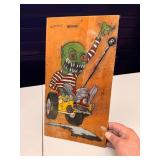 Rat Fink style hand drawn picture on wood plank
