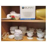 Variety of milk glass style mugs, v...