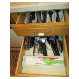 Variety of flatware, serving utensi...