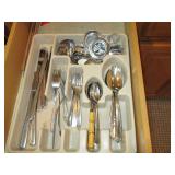 Variety of flatware, serving utensi...
