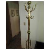 Freestanding brass tone hat and coa...