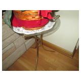 Brass tone side table with glass to...