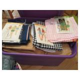 Covered tote full of fabrics, mater...