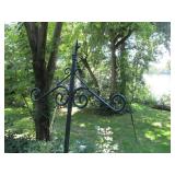 Tall metal shepherds hooks and bird...