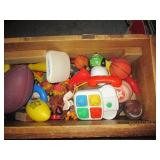 Toy box with vintage toys cowboys a...