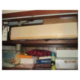 Top 2 shelves of office left closet...