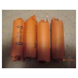 4 - 10 dollar rolls of quarters. As...