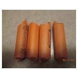 4 - 10 dollar rolls of quarters. As...