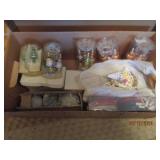 Box of Christmas ornaments and cand...