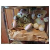 Small metal shelf with teddy bears ...