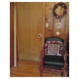 Black leather chair, pillow, 2 pict...