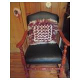 Black leather chair, pillow, 2 pict...