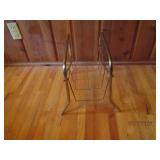 Shoe rack with shoes and a smaller ...