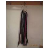 Variety of womens belts plus hanger...