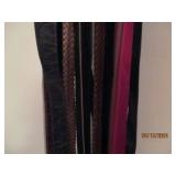 Variety of womens belts plus hanger...