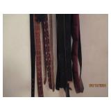 Variety of womens belts plus hanger...