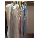 Group of linens with hangers...
