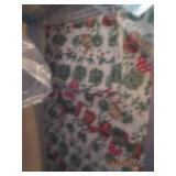 Group of linens with hangers...