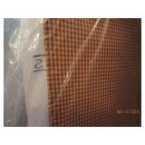 Group of linens with hangers...