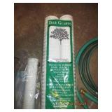 Tree guards, hose, and tree and shr...