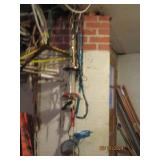 More items hanging in garage clothe...