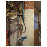 More items hanging in garage clothe...