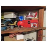 Contents of corner shelves in garag...