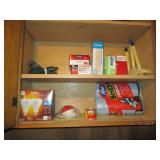 Contents of middle cupboards in sto...