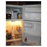 GE refrigerator and top section fre...