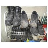 Corner contents behind the door of utility room including mens shoes and shop vac