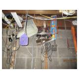 Contents hanging in utility room. Racquets, ice skates and more