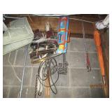 Contents hanging in utility room. Racquets, ice skates and more