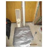 Can opener, roll of plastic and tarp