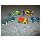 5 small Tonka toy vehicles...
