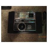 Vintage cameras and flash 3 piece...