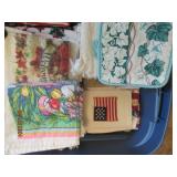 Towels and potholders for almost an...