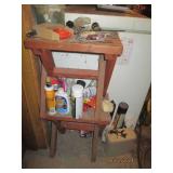 2 small benches and contents on and on floor mostly cleaning supplies