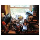 Contents on top of dresser in storage room