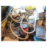 Contents on top of dresser in storage room