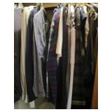 Closet contents. Mens button up shirts, dress pants, hats, blankets and more